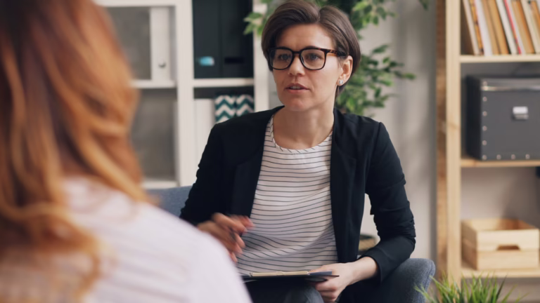 A therapist engaging a client in Socratic dialogue